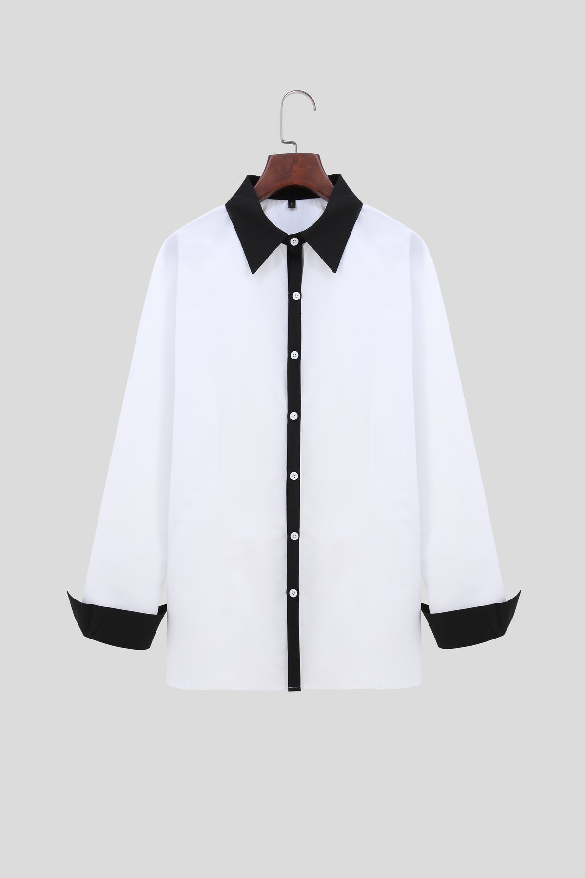 A Handsome Business And Fashionable Long-sleeved Shirt With Contrasting Colors For A Teenage Man